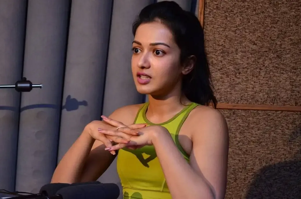 CATHERINE TRESA WITHOUT MAKEUP FACE STILLS IN GREEN TOP